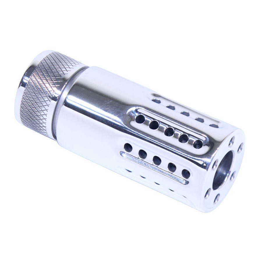 Stainless steel muzzle brake with knurling and precision-drilled ports for recoil reduction.