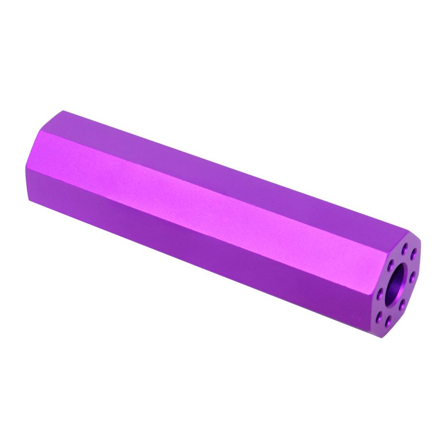 Purple anodized hexagonal aluminum component with circular opening, precision-machined for technical applications.