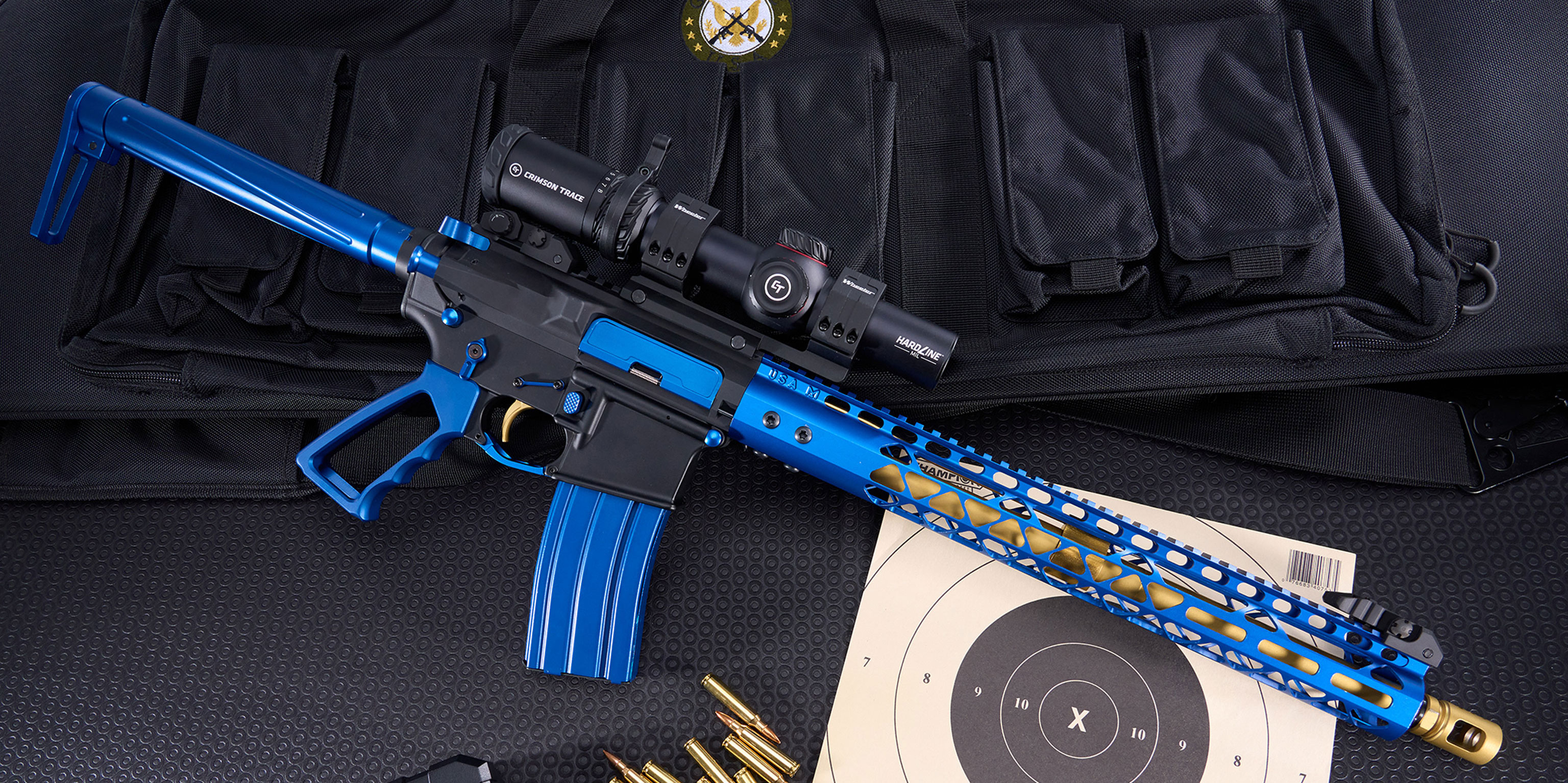 Custom blue and black assault rifle with tactical accessories and target display.
