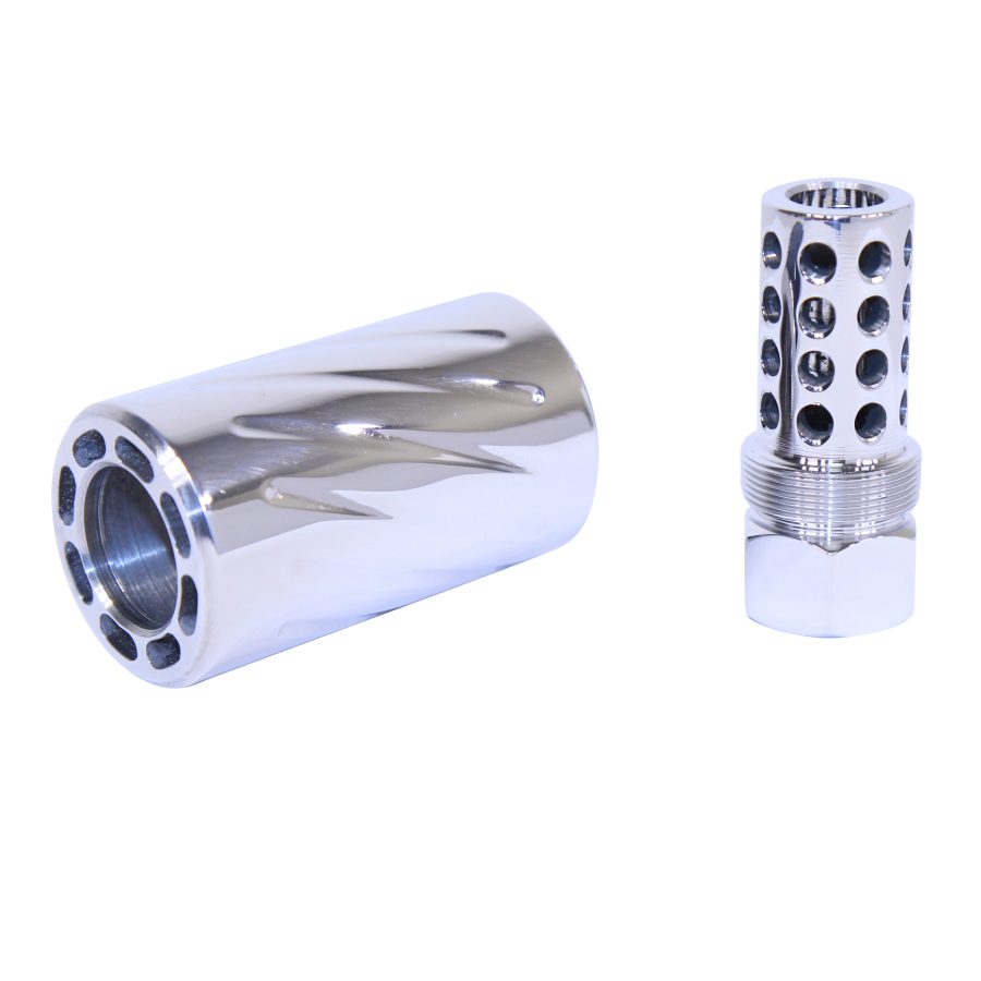 Precision machined firearm parts: polished muzzle brake and compensator with perforations.