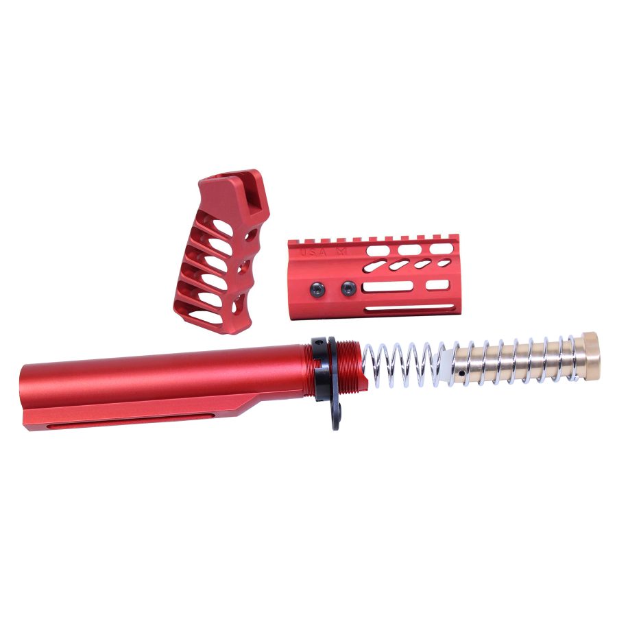 Vibrant red anodized AR-15 parts: buffer tube, ergonomic grip, and marked handguard.