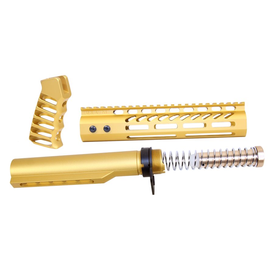 Gold anodized rifle accessories: grip, rail system, buffer tube for customized firearm upgrades.