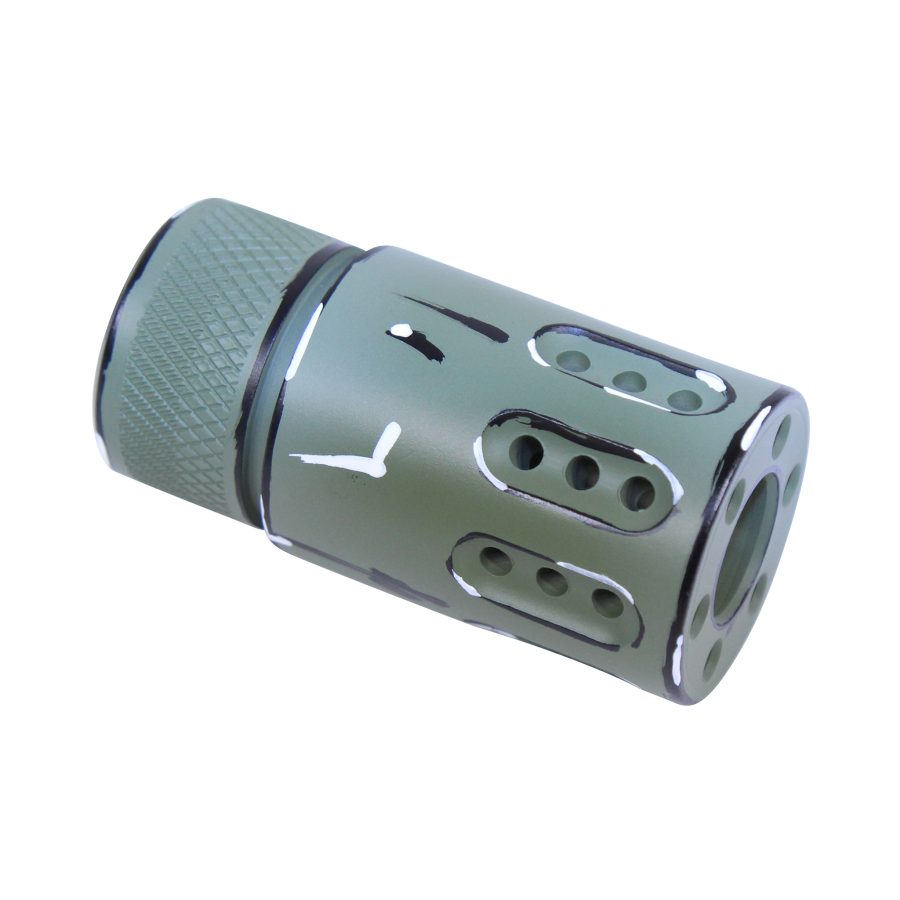 Olive green tactical muzzle brake with diamond knurling and precision-engineered ports for recoil reduction.