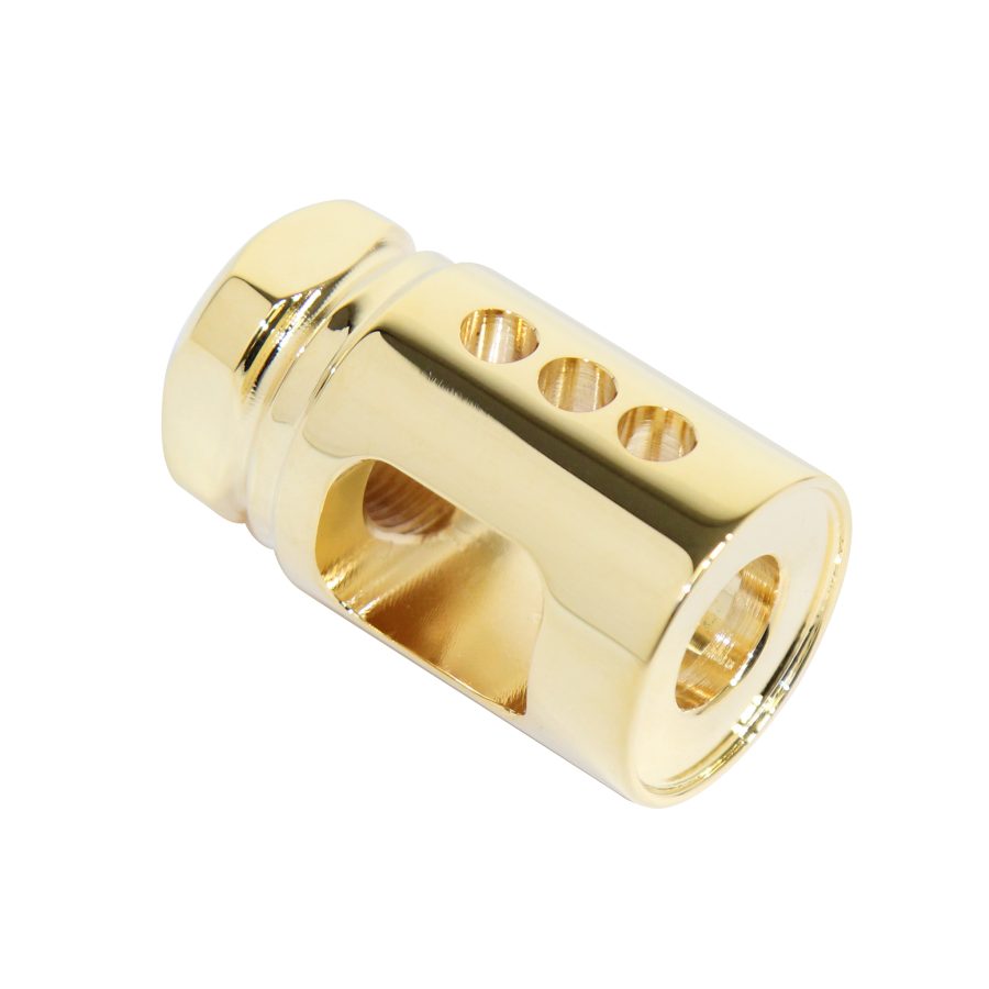 Polished gold muzzle brake with drilled ports for recoil reduction and firearm attachment.